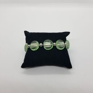 light green glass and silver tone ball stretch bracelet